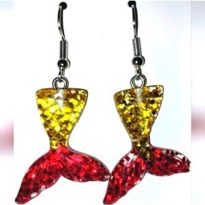 Super cute gold and ruby colored mermaid tail dingle earrings